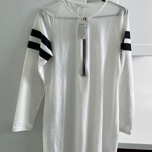 Shirt/ dress new white with black stripes on sleeves, size small.